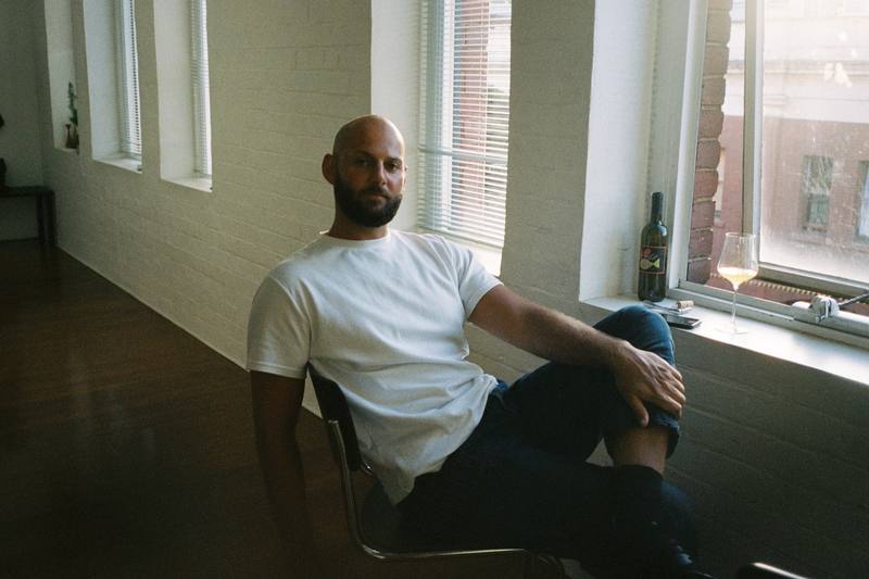 Mark Cronje, founder of March, seated by a window